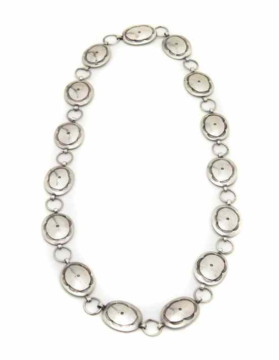 A Navajo Sterling Silver Link Concho Belt circa 1940 having