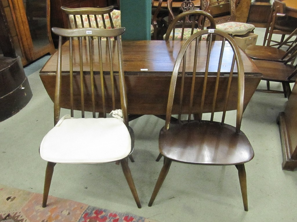 Ercol dining table with six chairs 7