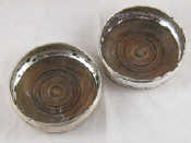 A pair of silver coasters London 1970