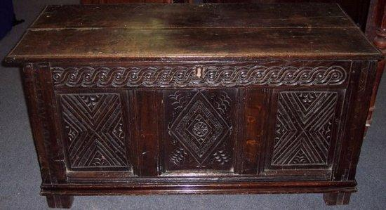 A carved oak chest 111cm 43 5 wide