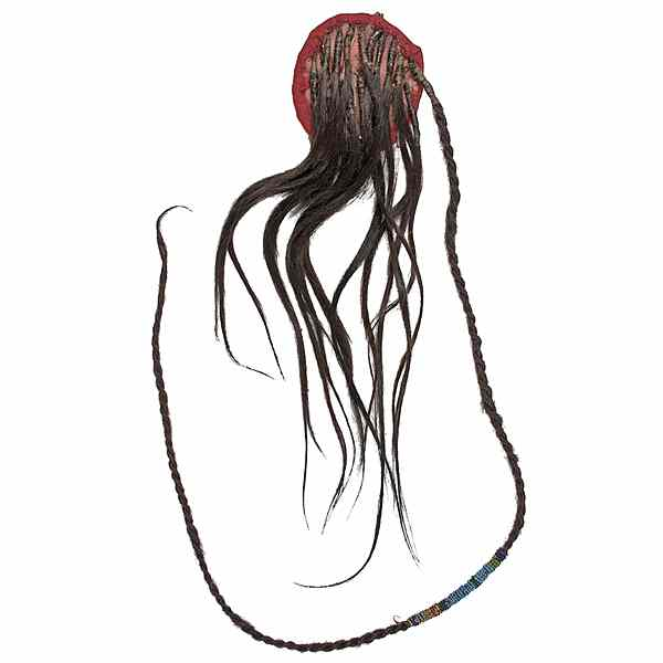 Plains Hair Ornament circular hide disk wrapped in red wool