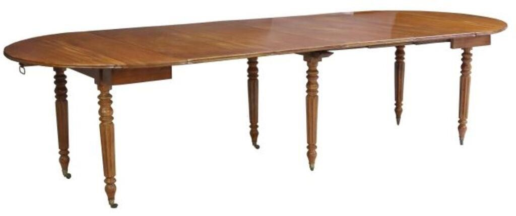 French fruitwood extension dining table late 19th c having oval