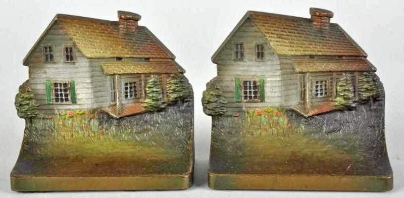 Pair of Cast Iron Edgar Allen Poe Cabin Bookends Description