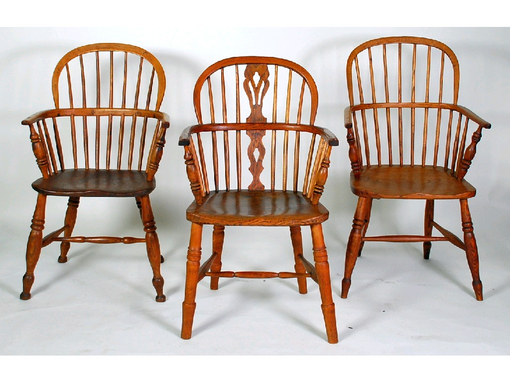 MATCHED SET OF FOUR ELM STICK BACK LOW WINDSOR ARMCHAIRS