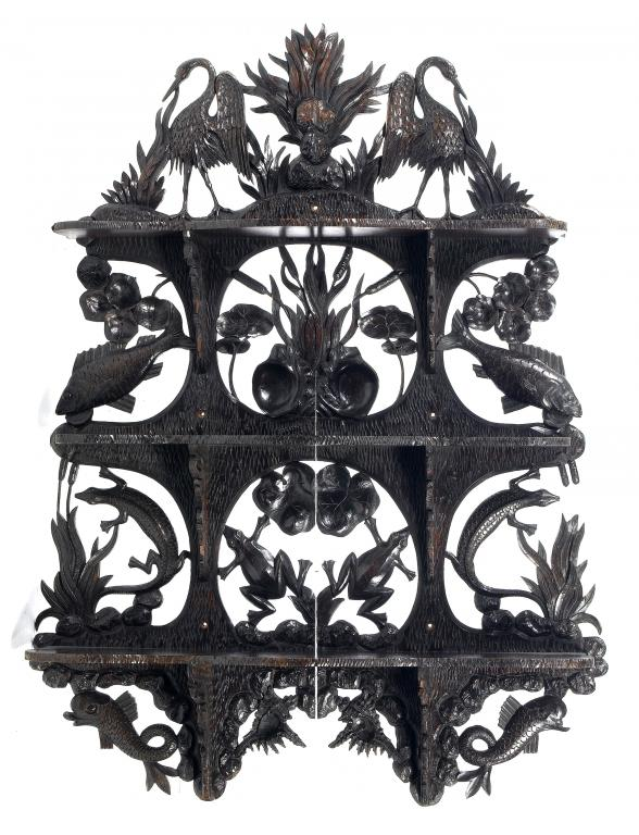 A SET OF AESTHETIC MOVEMENT CARVED AND EBONISED OAK WALL