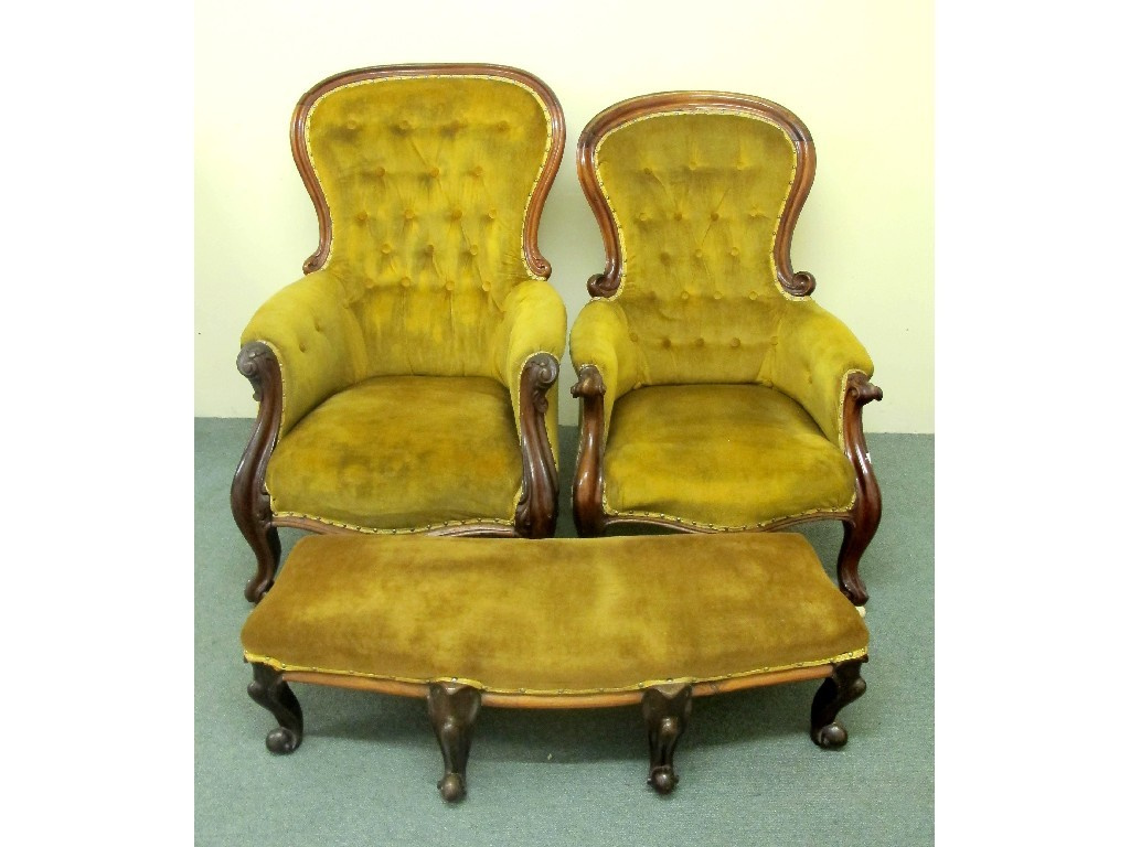 A pair of Victorian mahogany framed buttonback ladies and gents
