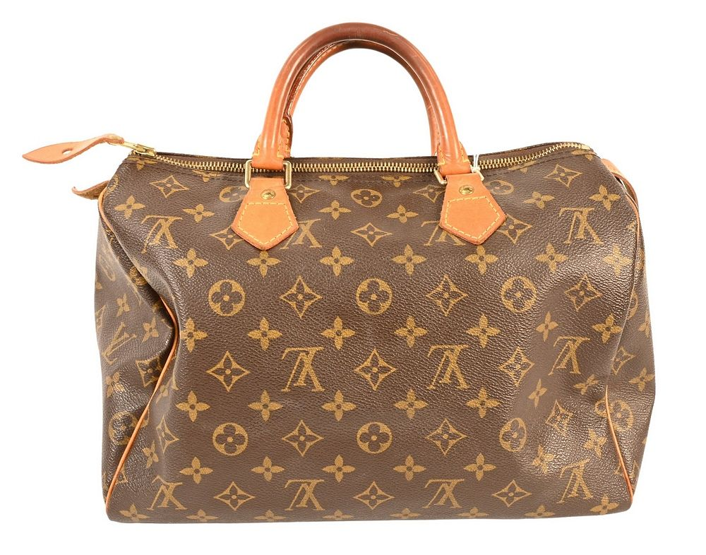 Louis Vuitton Canvas Logo Speedy Handbag having double handle single