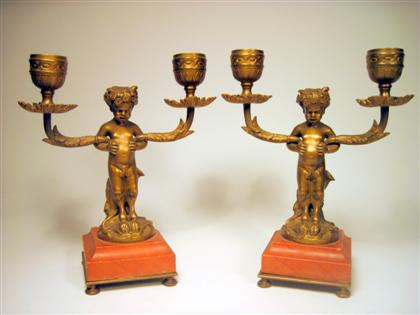 Pair of French gilt bronze and marble candelabraEach with a