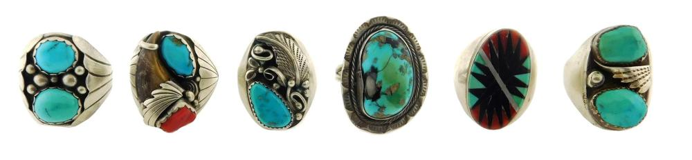 Six Southwestern style silver rings with inlaid turquoise all tested