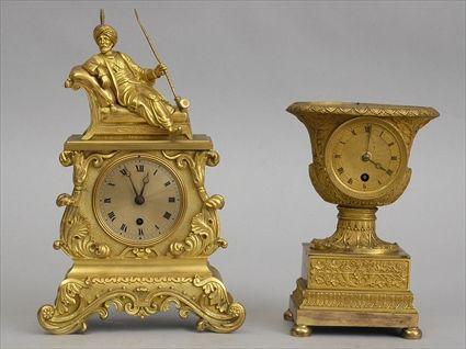 CHARLES X GILT BRONZE CLOCK AND A LOUIS PHILIPPE BRONZE