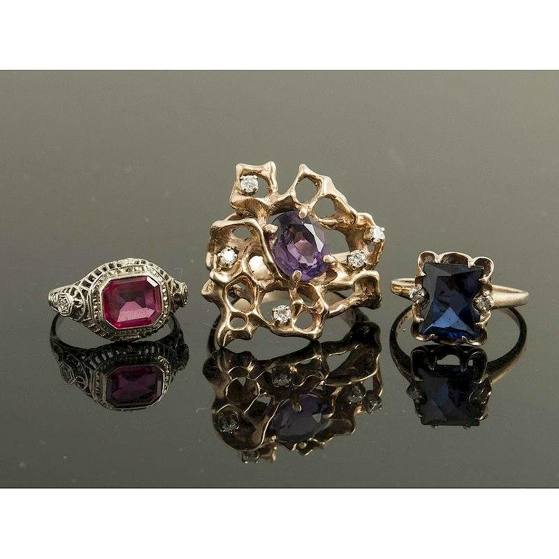 Three Gemstone Rings Lot of three rings comprising a synthetic