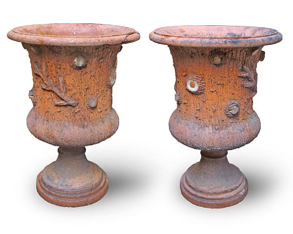 A pair of Victorian terra cotta tree trunk form circular