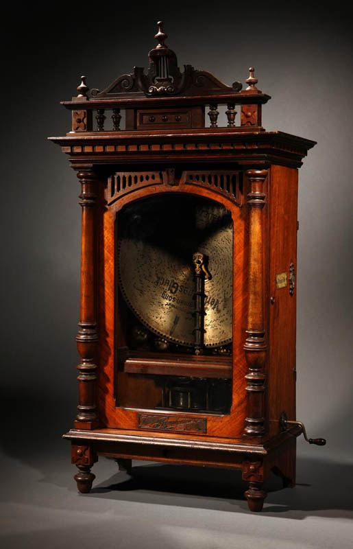 A Victorian Symphonion upright disk music box A Victorian Symphonion