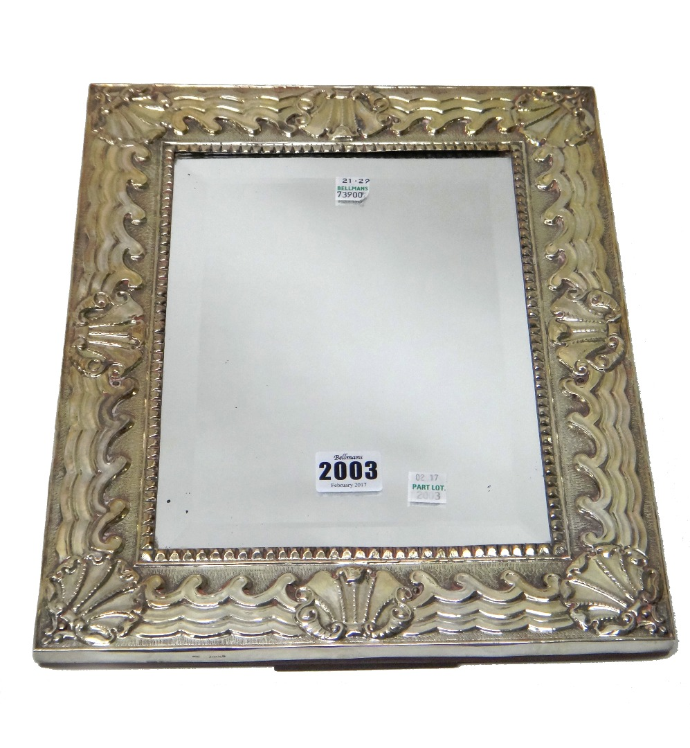 A silver mounted rectangular strut backed mirror the wide border
