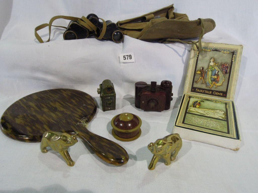 A miscellaneous collection of items including two miniature Bakelite cameras
