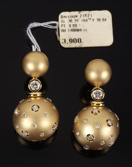 A pair of 18 carat yellow gold and diamond drop
