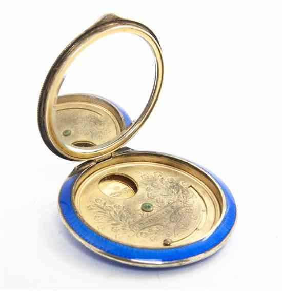 An Austrian Silver and Guilloche Enameled Compact of circular form