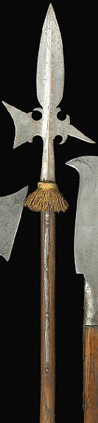A German halberdearly 17th century Having a broad 10 inch
