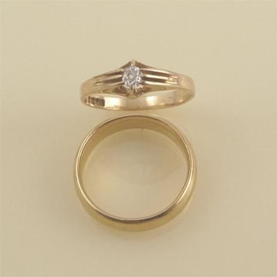 An 18ct gold gypsy set diamond single stone ring 3g