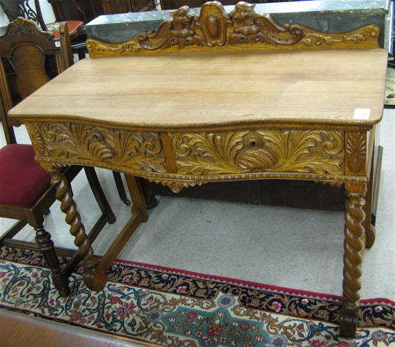 LATE VICTORIAN OAK DRESSING TABLE American c 1890 having an