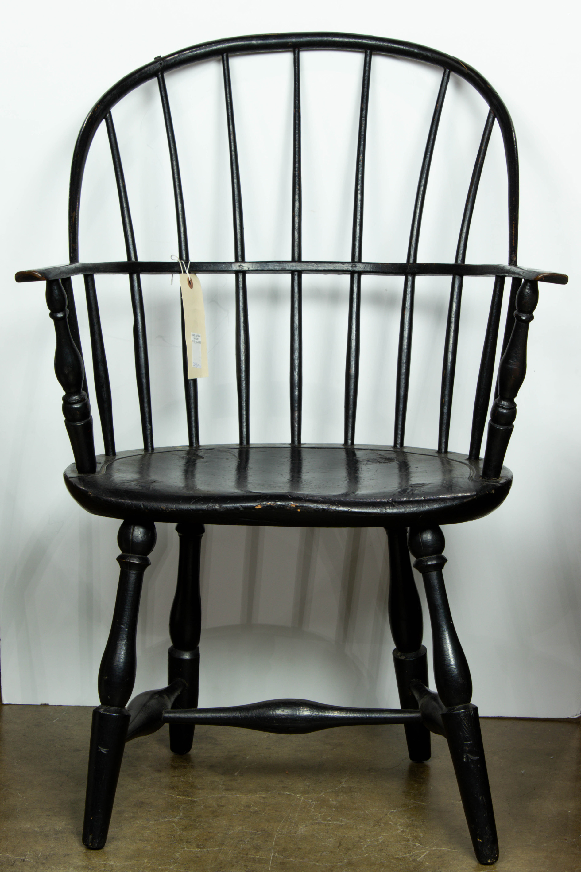 AN EBONIZED WINDSOR CHAIR An Ebonized Windsor chair 37 h