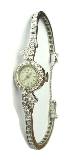 A ladies white gold and diamond set bracelet wristwatch the