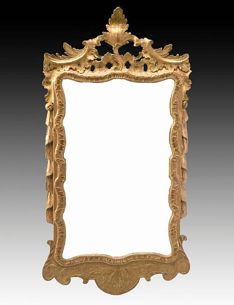 A George II carved giltwood mirror second quarter 18th century
