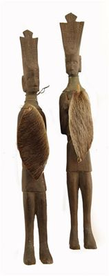 A pair of carved ebony Kamba figures each with a