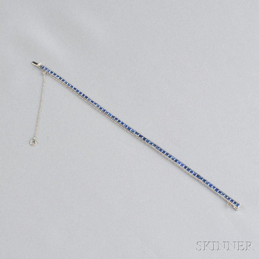 Platinum and Sapphire Line Bracelet Cartier set with sixty four