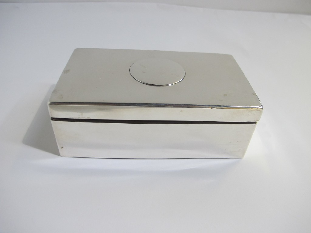 A silver cigarette box London 1890