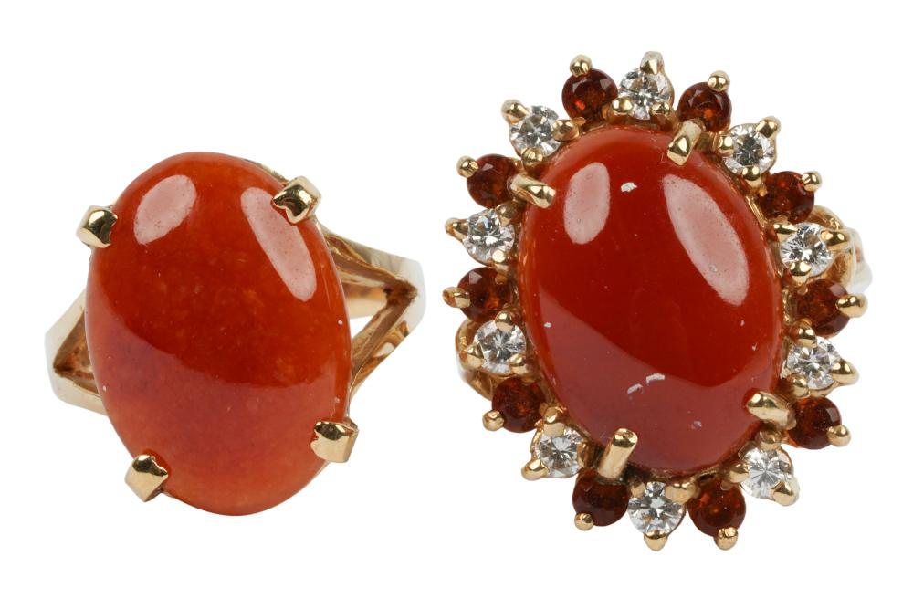 TWO 14 KARAT YELLOW GOLD BROWN JADE RINGSthe first centering