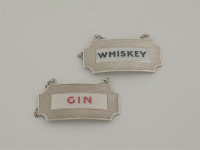 A pair of art deco labels oblong with in curved