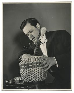 Welles Orson Two Photographs of Orson Welles with Magic Props