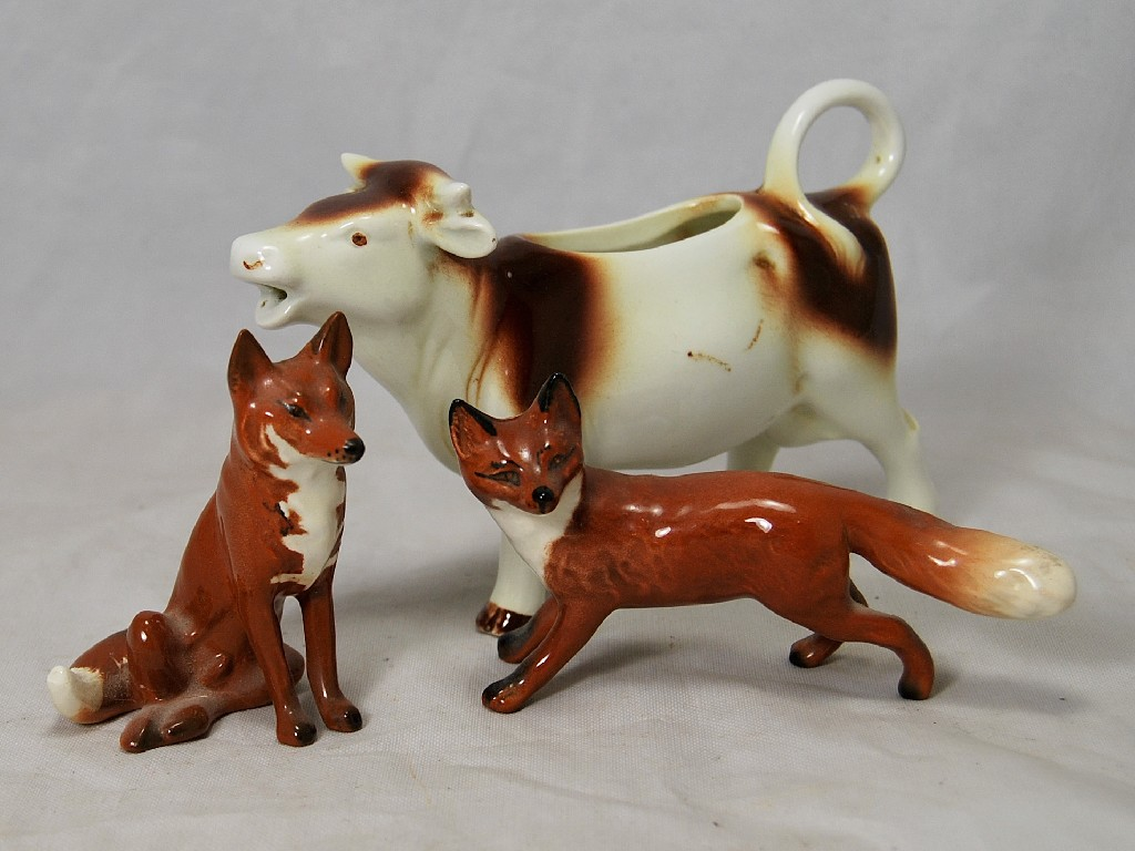 Two Beswick foxes and a Goebels cow creamer 3