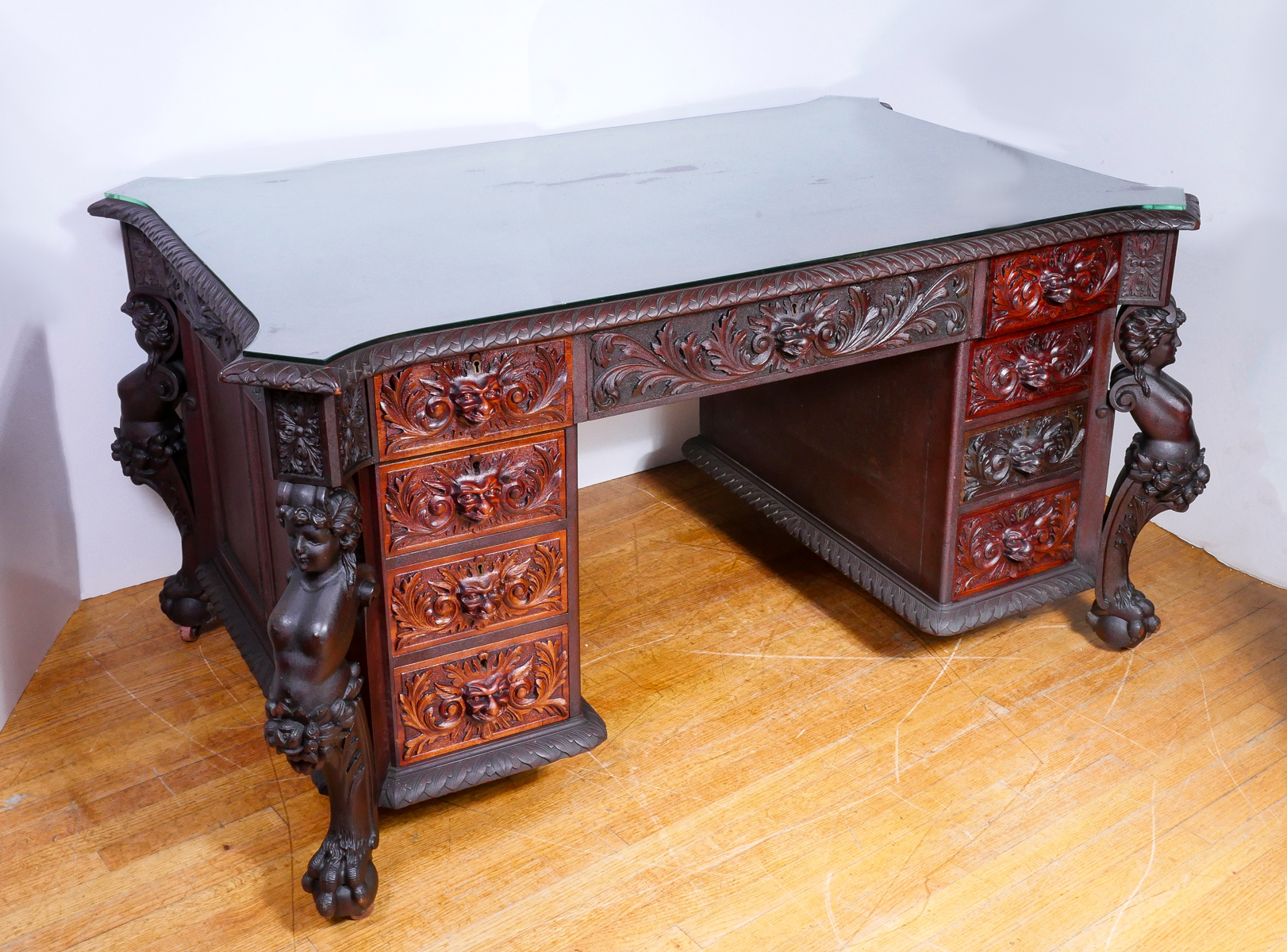 RJ HORNER CARVED MAHOGANY PARTNERS DESK Form fitting glass top