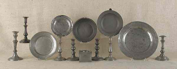 Thirteen pieces of pewter 19th c to include candlesticks a