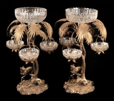 A pair of silver plated table centrepieces modelled after Pierre