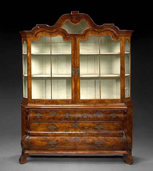 A Dutch Rococo walnut display cabinet late 18th early 19th