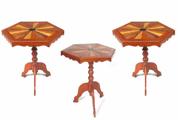 A set of three octagonal radial inlaid tables height 27