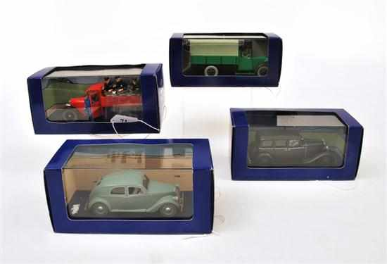 FOUR EN VOITURE TINTIN FIGURES FROM TINTIN COMICS INCLUDING 2