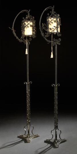 Pair of Wrought and Cut Iron Floor Lanterns attributed to