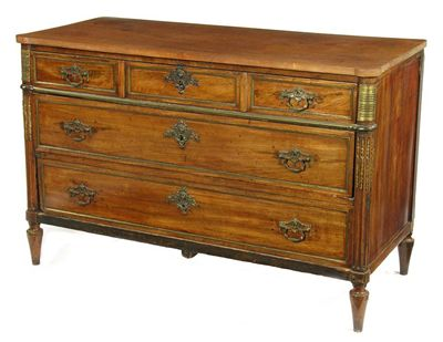 An early 19th century French mahogany commode with gilt brass