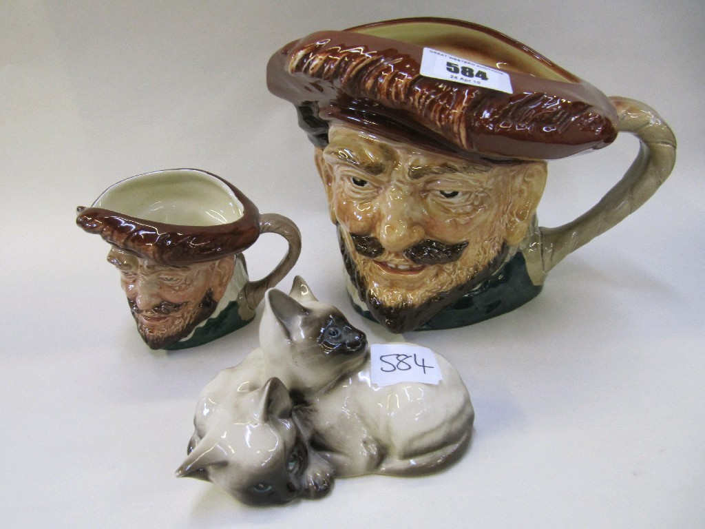 Two Royal Doulton Drake character jugs and a Beswick figure