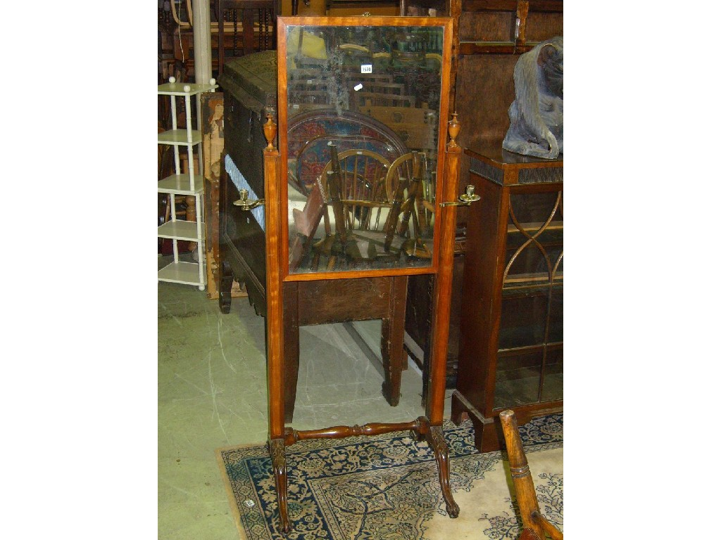 A Regency mahogany cheval glass with rising mirror panel with