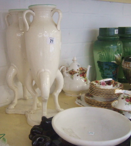 A pair of French white crackle glazed amphora vases on