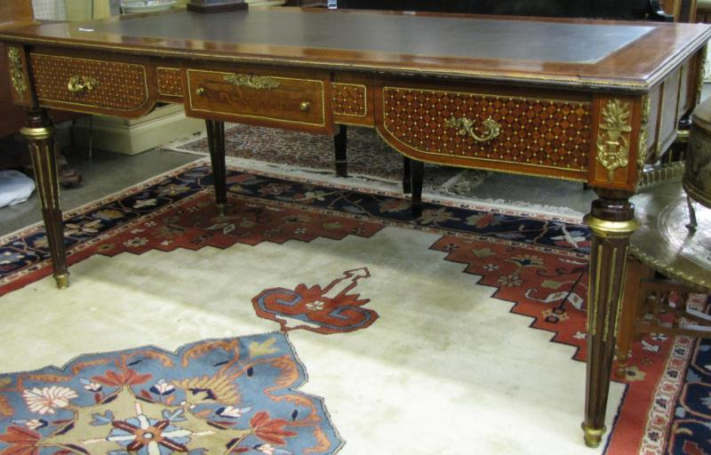 Period style Rosewood leather top desk banded and inlaid with