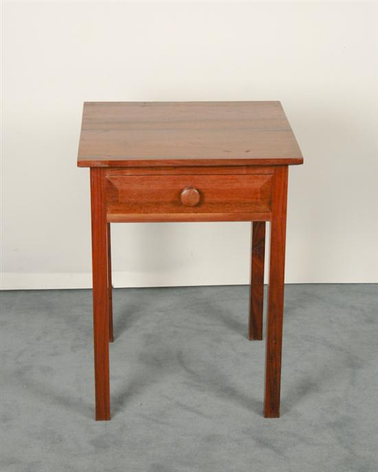 A 19th C Walnut Single Drawer Stand having an overhanging