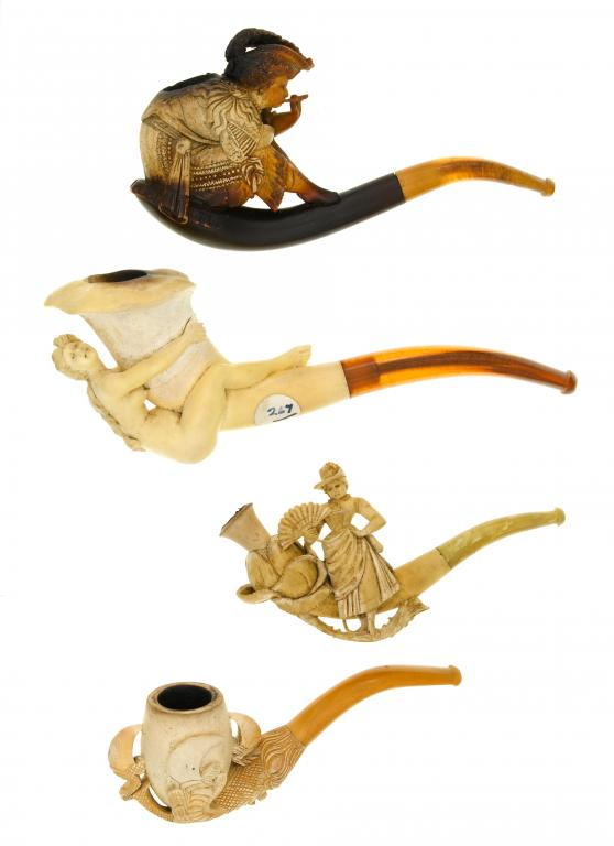 AN AUSTRIAN MEERSCHAUM TOBACCO PIPE carved with the full length