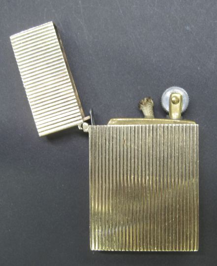 Diminutive French Fourteen Karat Gold Cigarette Lighter second quarter 20th
