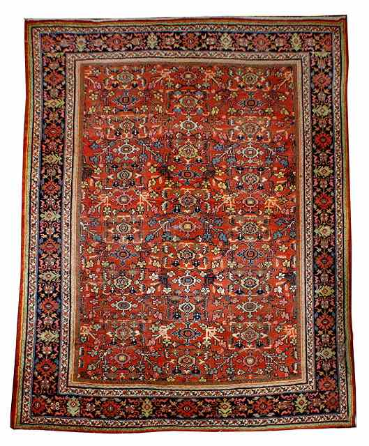 A MAHAL RUST GROUND CARPET with an all over stylised